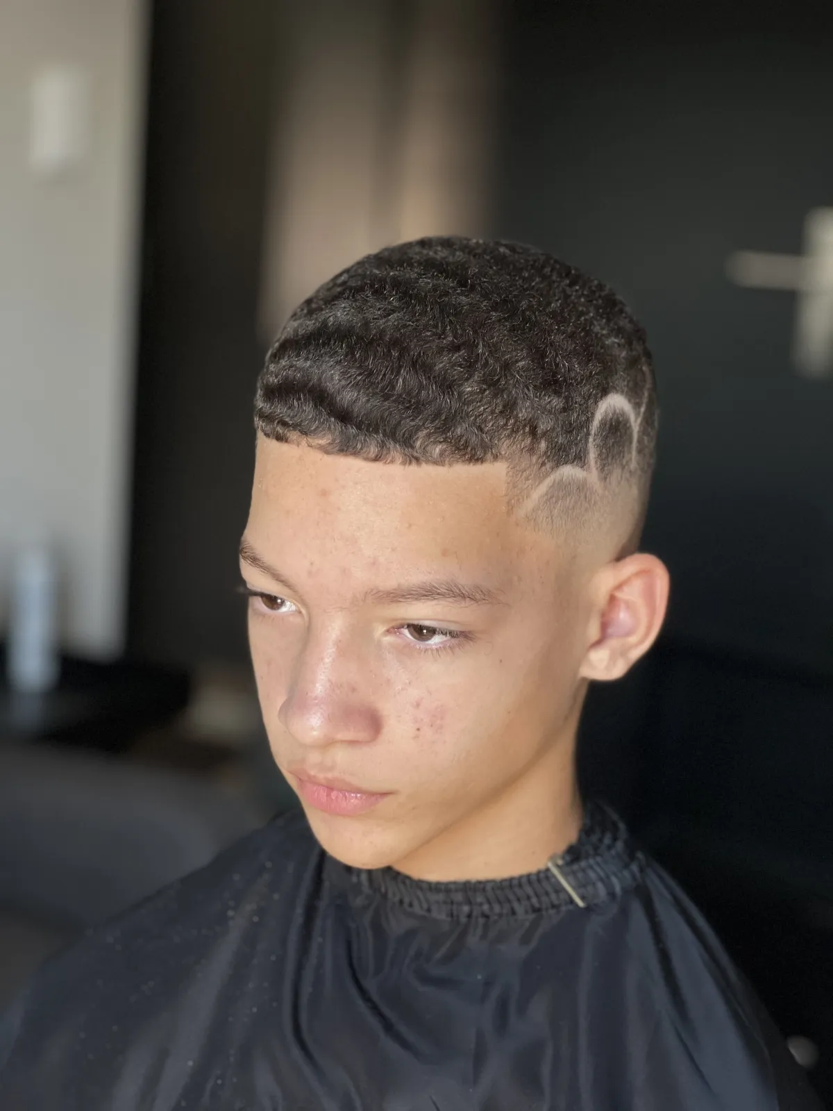 Brush fade haircut by Moses